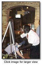 David Crawford gives a chair massage as part of a promotional event at a local restaurant.